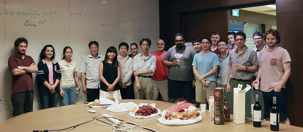 Masahito Hayashi celebrating with colleagues.